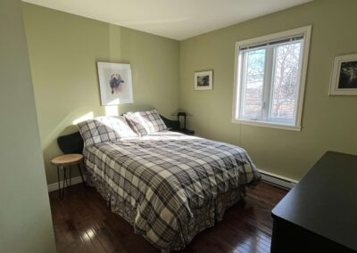 Chalet Berceau de l'Anse - Chambre située au rez-de-chaussée